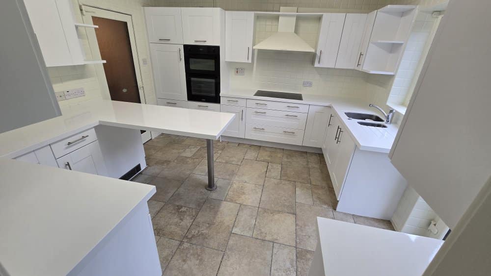 White kitchen cabinet respray completed by Spray Masters